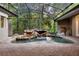 Gorgeous screened-in pool with a rock waterfall feature, offering a private oasis for relaxation at 4107 Gabriella Ln, Winter Park, FL 32792