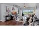 Spacious living room with a sliding glass door that offers scenic outdoor views at 425 Eagle Ridge Dr # 425, Davenport, FL 33837
