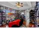 Custom living room with vaulted ceiling, ceiling fan and TV at 425 Eagle Ridge Dr # 425, Davenport, FL 33837