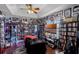 Custom living room with vaulted ceiling, ceiling fan and TV at 425 Eagle Ridge Dr # 425, Davenport, FL 33837