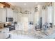 Stylish kitchen with white cabinets, granite countertops, stainless appliances, and tiled backsplash at 441 Hightower Dr, Debary, FL 32713