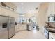 Bright kitchen featuring stainless steel appliances, tile floors, and granite countertops at 441 Hightower Dr, Debary, FL 32713