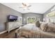 The main bedroom features vaulted ceilings, hardwood floors, and a large walk-in closet at 441 Hightower Dr, Debary, FL 32713