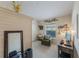 Bright office space with decor, a desk setup and accent lighting, natural light from the window and an accent wall at 441 Hightower Dr, Debary, FL 32713