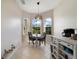 Cozy breakfast nook illuminated by natural light from three large windows, perfect for casual dining at 4558 Redmond Pl, Sanford, FL 32771