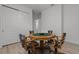 Cozy game room with an octagonal table, rolling chairs, and light wood flooring at 5013 E Fountainwood Dr, St Cloud, FL 34772
