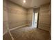 Large walk-in closet with wire shelving, carpet flooring, and neutral paint at 5262 Teirgarten St, St Cloud, FL 34771