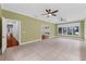 Versatile bonus room with neutral tile floors and lots of natural light at 5655 Oak Hollow Ln, Oviedo, FL 32765