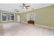 Versatile bonus room with neutral tile floors and lots of natural light at 5655 Oak Hollow Ln, Oviedo, FL 32765
