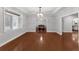 Formal dining room with modern light fixture and hardwood floors at 5655 Oak Hollow Ln, Oviedo, FL 32765