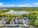 Aerial view of the apartment complex and the lush green landscaping around the property at 581 Brantley Terrace Way # 302, Altamonte Springs, FL 32714