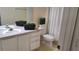 Bathroom featuring a single sink vanity and decorative plants at 581 Brantley Terrace Way # 302, Altamonte Springs, FL 32714