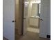 Bathroom featuring a vanity with a tile floor and an adjacent closet at 581 Brantley Terrace Way # 302, Altamonte Springs, FL 32714