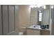 Bathroom featuring a single sink vanity and decorative plants at 581 Brantley Terrace Way # 302, Altamonte Springs, FL 32714