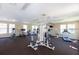 Fully-equipped gym with treadmills, weight machines, and ceiling fans for residents' fitness needs at 581 Brantley Terrace Way # 302, Altamonte Springs, FL 32714