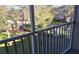 Screened porch overlooking lush landscaping and mature trees provides a tranquil outdoor space at 581 Brantley Terrace Way # 302, Altamonte Springs, FL 32714