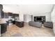 Open floor plan view of the kitchen, island and living room featuring modern furnishings at 6984 Dilly Lake Ave, Groveland, FL 34736