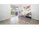 Bright playroom with a decorative world map, sliding door and neutral tones at 6984 Dilly Lake Ave, Groveland, FL 34736