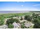 Aesthetic aerial shot of community near lake and wetlands, offering serene natural beauty at 701 Lakeshore Blvd, St Cloud, FL 34769