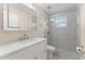 Modern bathroom featuring a glass-enclosed shower, updated vanity, and contemporary fixtures for a luxurious feel at 701 Lakeshore Blvd, St Cloud, FL 34769