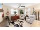 Inviting bedroom with natural light, decorative guitars, and cozy seating area at 701 Lakeshore Blvd, St Cloud, FL 34769