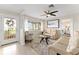Cozy living room with ample natural light, neutral décor, and access to an outdoor view at 701 Lakeshore Blvd, St Cloud, FL 34769