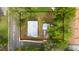 An aerial view shows the house and backyard bordered in red, surrounded by trees and neighborhood streets at 715 Ballard St, Altamonte Springs, FL 32701
