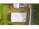 Aerial view of a single-story home with a fenced yard and a sidewalk at 715 Ballard St, Altamonte Springs, FL 32701