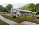 Charming single-story home featuring a fenced yard and a traditional architectural style at 715 Ballard St, Altamonte Springs, FL 32701