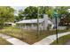 Corner lot featuring a single-story home with a fenced yard and a sidewalk at 715 Ballard St, Altamonte Springs, FL 32701