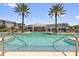 Resort-style community pool with clear water and inviting lounge areas at 7573 Laureate Blvd # 1-404, Orlando, FL 32827