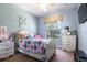 Cozy bedroom with a window view, ceiling fan, and matching dressers at 804 Challis Pt, Longwood, FL 32779