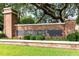 Welcoming entrance sign to the Highcroft community, surrounded by lush landscaping at 804 Challis Pt, Longwood, FL 32779