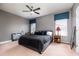 Spacious primary bedroom with neutral walls, a ceiling fan, and a window for natural light at 804 Challis Pt, Longwood, FL 32779