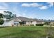 Charming single-story home featuring well-maintained lawn, lovely landscaping, and a welcoming facade at 842 Amidon St, Deltona, FL 32725