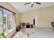 Bright living room featuring a large window, neutral carpet, and plenty of space for entertainment at 842 Amidon St, Deltona, FL 32725