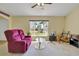 Cozy living room with a large window, comfortable seating, and ample space for relaxation and hobbies at 842 Amidon St, Deltona, FL 32725