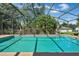 Backyard pool with screened enclosure and landscaped surroundings, creating a relaxing outdoor space at 842 Amidon St, Deltona, FL 32725