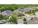 Aesthetic aerial view of the home in a peaceful suburban neighborhood at 8420 Corkfield Ave, Orlando, FL 32832