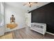 Bedroom with a fun space themed wall and white floors at 8420 Corkfield Ave, Orlando, FL 32832