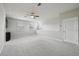 Bright bonus room with neutral walls, carpet, and modern ceiling fan at 8420 Corkfield Ave, Orlando, FL 32832