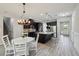 Spacious kitchen with a large island, stainless steel appliances and wood look flooring at 8420 Corkfield Ave, Orlando, FL 32832