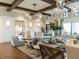 Elegant lounge area with stylish furniture, ambient lighting, and decorative plants at 8943 Coconut Breeze Dr, Kissimmee, FL 34747