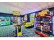 Bright and colorful game room with a variety of arcade games for endless entertainment at 8989 Cuban Palm Rd, Kissimmee, FL 34747