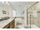Bright bathroom features a shower-tub combo and tile floors at 8989 Cuban Palm Rd, Kissimmee, FL 34747