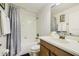 Bathroom with a shower-tub combo and neutral gray accents at 8989 Cuban Palm Rd, Kissimmee, FL 34747