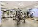 Well-equipped fitness center with modern exercise machines and mirrored walls for a complete workout experience at 8989 Cuban Palm Rd, Kissimmee, FL 34747