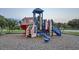 Neighborhood playground equipped with slides, steps and various play elements for recreational activities at 8989 Cuban Palm Rd, Kissimmee, FL 34747