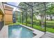 Enjoy the privacy of this screened-in pool with views of the surrounding greenery at 8989 Cuban Palm Rd, Kissimmee, FL 34747