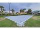 Outdoor sand volleyball court providing a recreational space for residents and guests to enjoy beach volleyball games at 8989 Cuban Palm Rd, Kissimmee, FL 34747